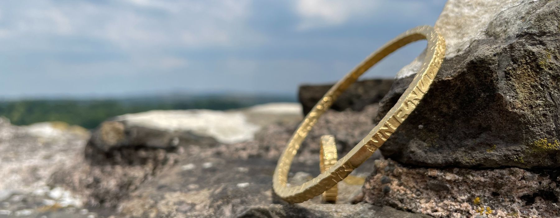 Yellow gold bangles from the Cofio collection by Welsh jeweller Mari Thomas