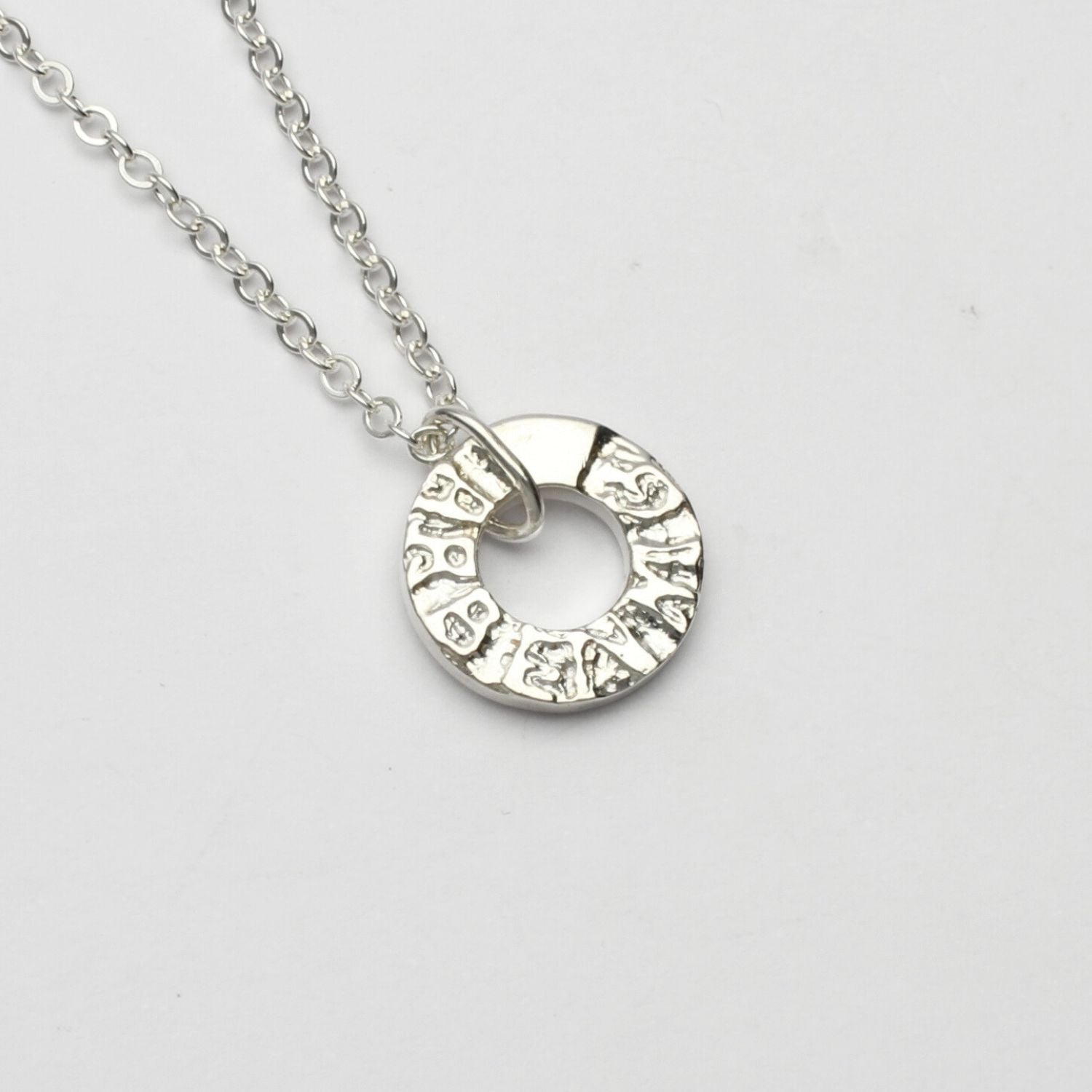 Arbennig sterling silver charm pendant, close-up of handwritten lettering
