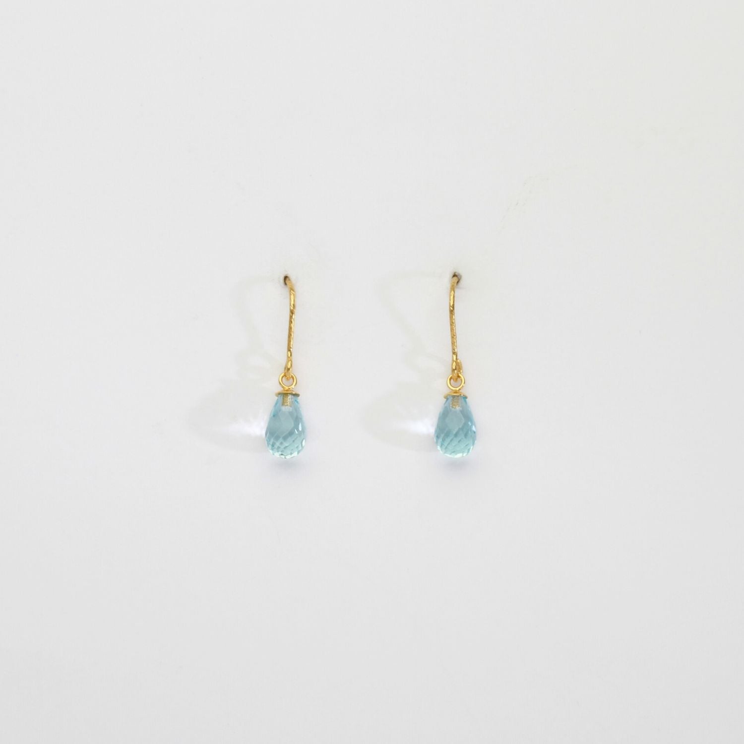 Blue topaz silver 22ct gold plated hook earrings by Charlotte Reid