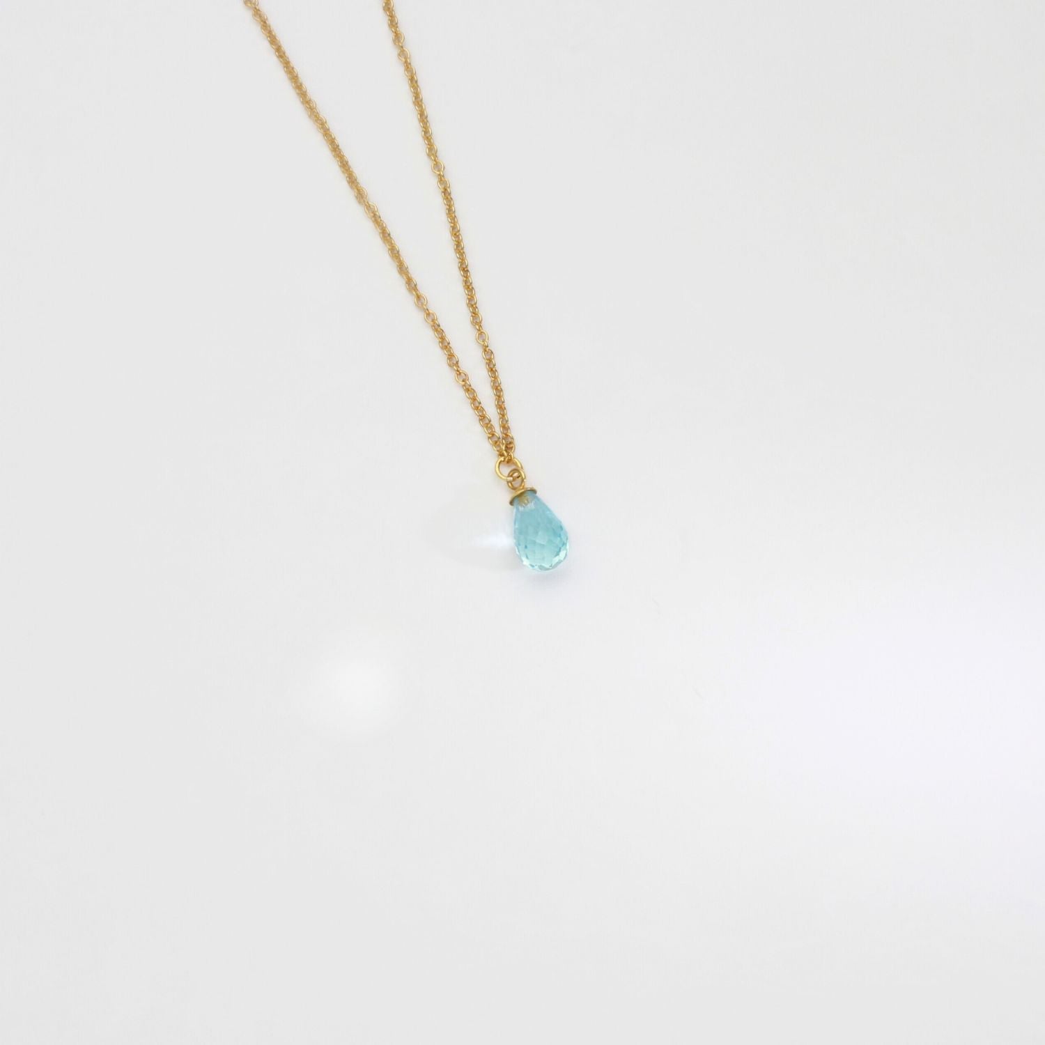 Blue topaz silver 22ct gold plated necklace by Charlotte Reid