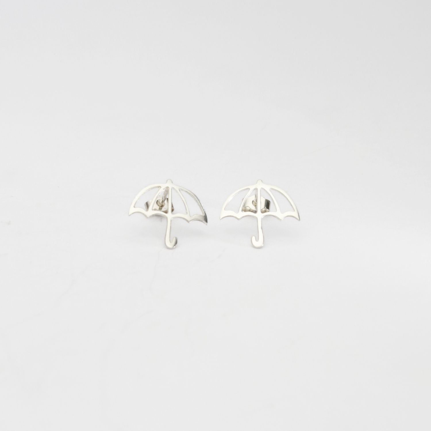 Brolly outline silver studs by Kate Wimbush