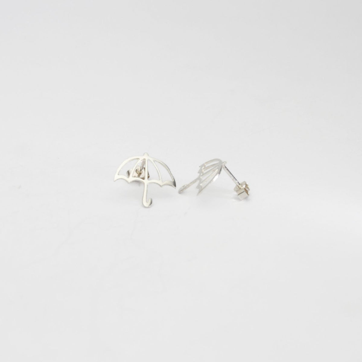 Brolly outline silver studs by Kate Wimbush
