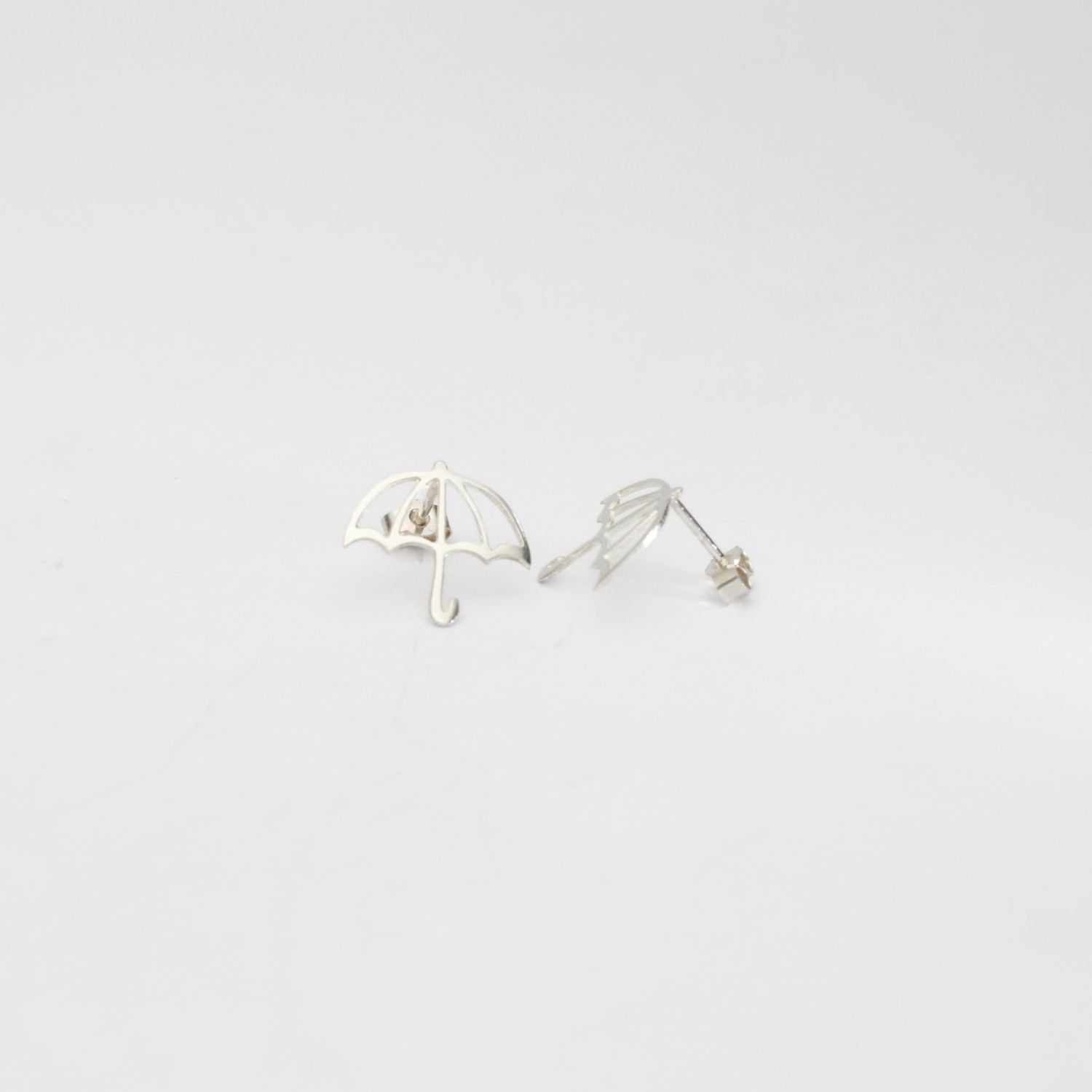 Brolly outline silver studs by Kate Wimbush