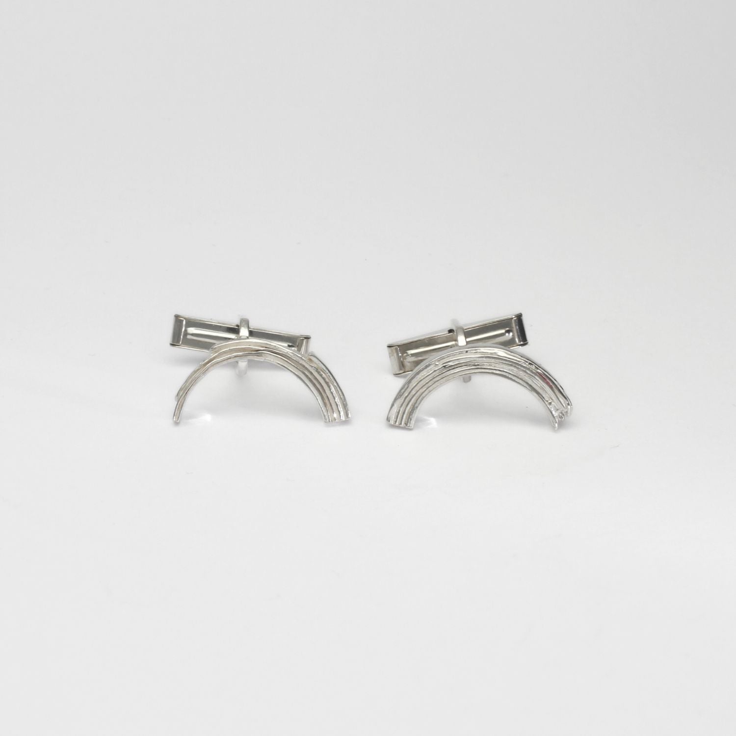 Brushstroke cufflinks, sterling silver — a fluid painted line brought into everyday tailoring — Botymau Coesau Arian