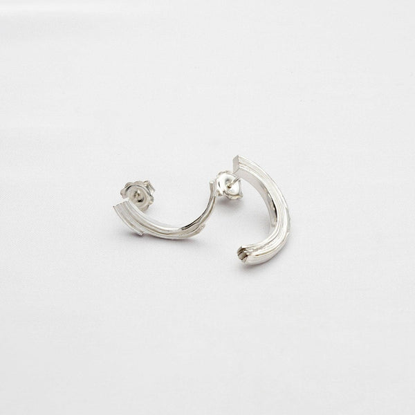 Brushstroke earrings, sterling silver — fluid line inspired by a single sweep of paint — Clustdlysau Arian