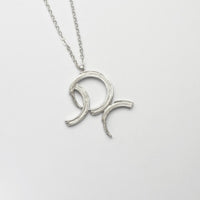 Brushstroke large pendant, sterling silver — a bold sweep of paint cast in metal — Mwclis Arian
