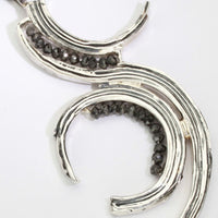 Brushstroke pendant in black oxidised silver with black diamonds, close-up detail