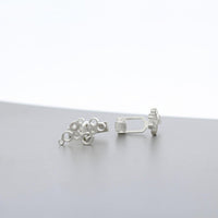 Side view of the Bubbles cufflinks, effervescent sterling silver design — Botymau Coesau Arian