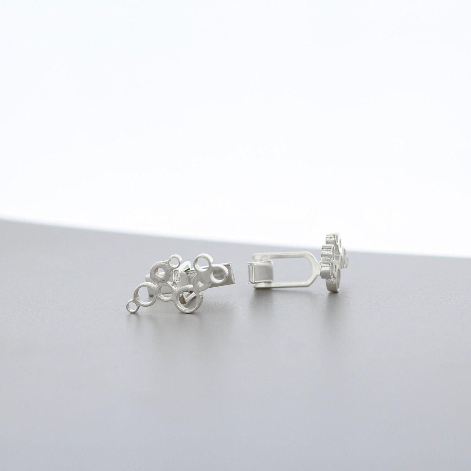 Side view of the Bubbles cufflinks, effervescent sterling silver design — Botymau Coesau Arian