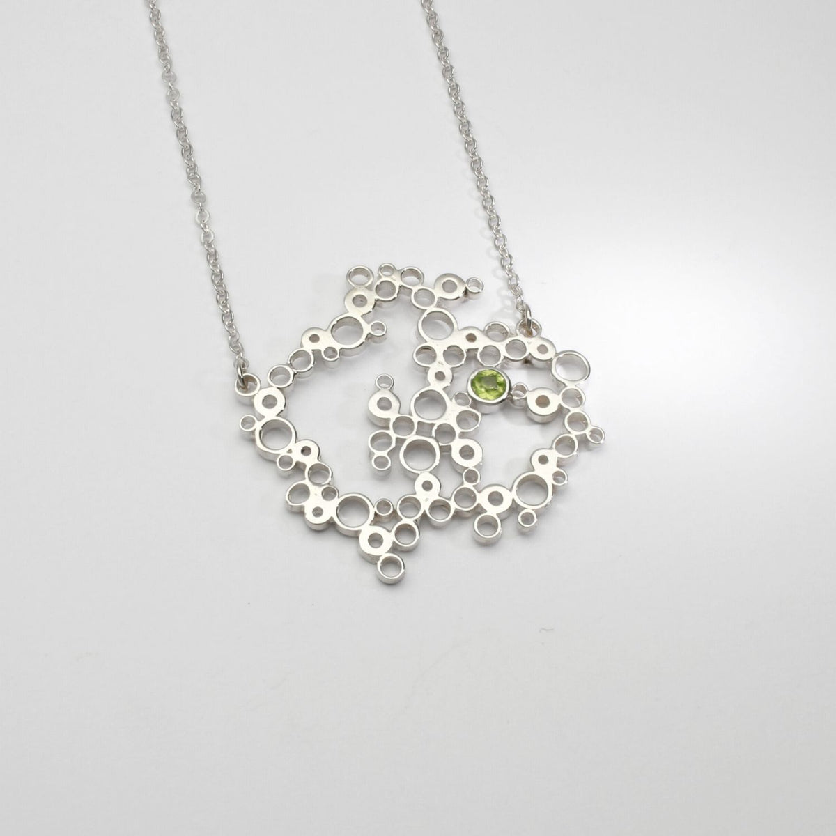 Bubbles pendant set with peridot, sterling silver — clustered circles inspired by rising champagne bubbles — Mwclis Arian
