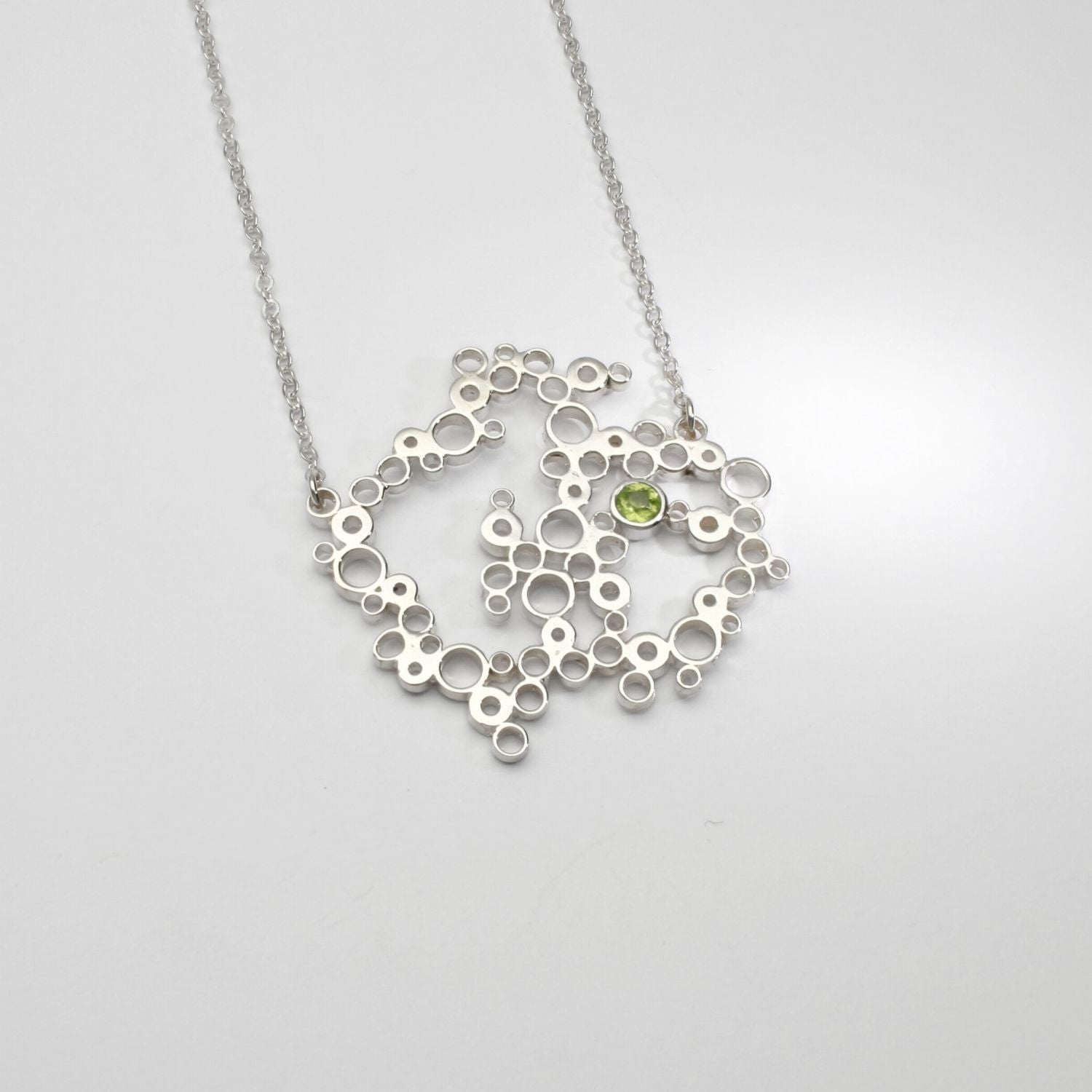 Bubbles pendant set with peridot, sterling silver — clustered circles inspired by rising champagne bubbles — Mwclis Arian