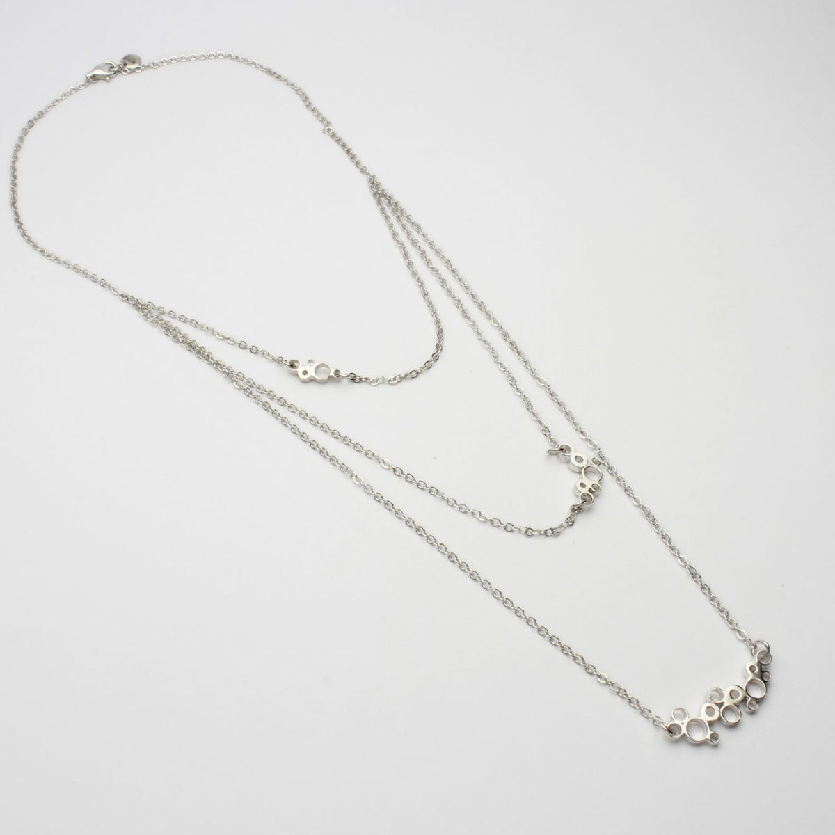 Bubbles layered necklace, sterling silver — clustered circles inspired by rising champagne bubbles — Mwclis Arian