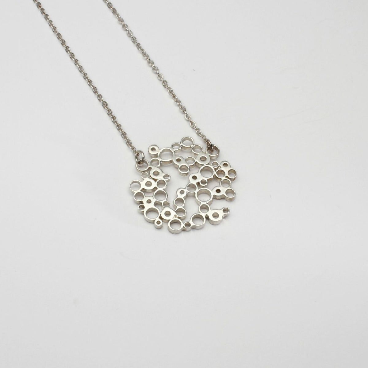 Bubbles medium pendant, sterling silver — clustered circles inspired by rising champagne bubbles — Mwclis Arian