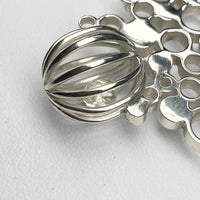 Close-up of the uncut diamond set in the No.19 Bubbles necklace — Mwclis Arian