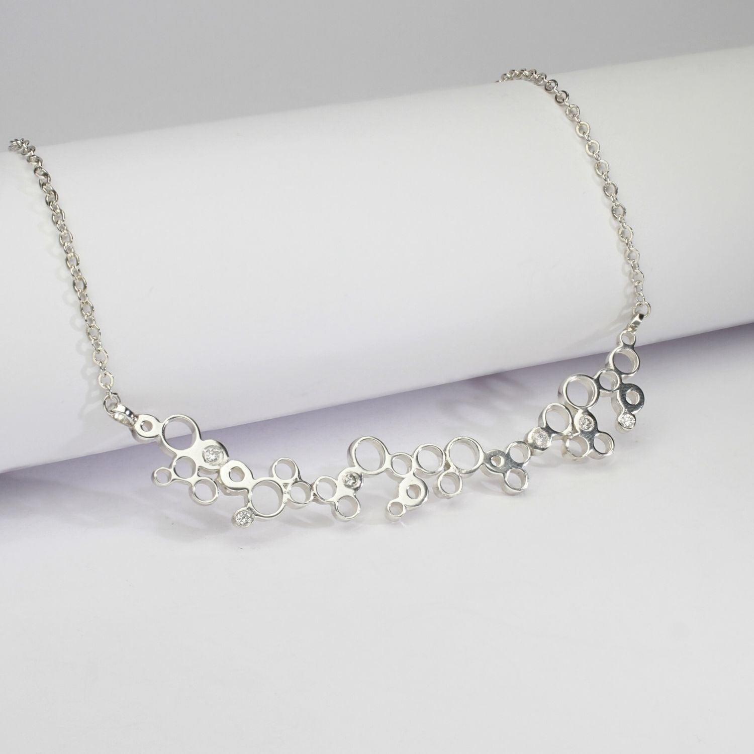 One of a kind Bubbles necklace, sterling silver and diamonds — clustered circles inspired by rising champagne bubbles — Mwclis Arian
