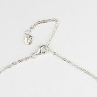 Bespoke Bubbles necklace on its chain, echoing bubbles in a glass — Mwclis Arian