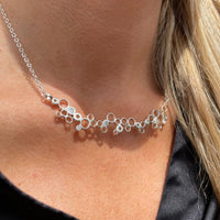 Bespoke Bubbles diamond necklace, side view of the celebration-inspired design — Mwclis Arian