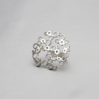 Bubbles statement ring, sterling silver — clustered circles inspired by rising champagne bubbles — Modrwy Arian
