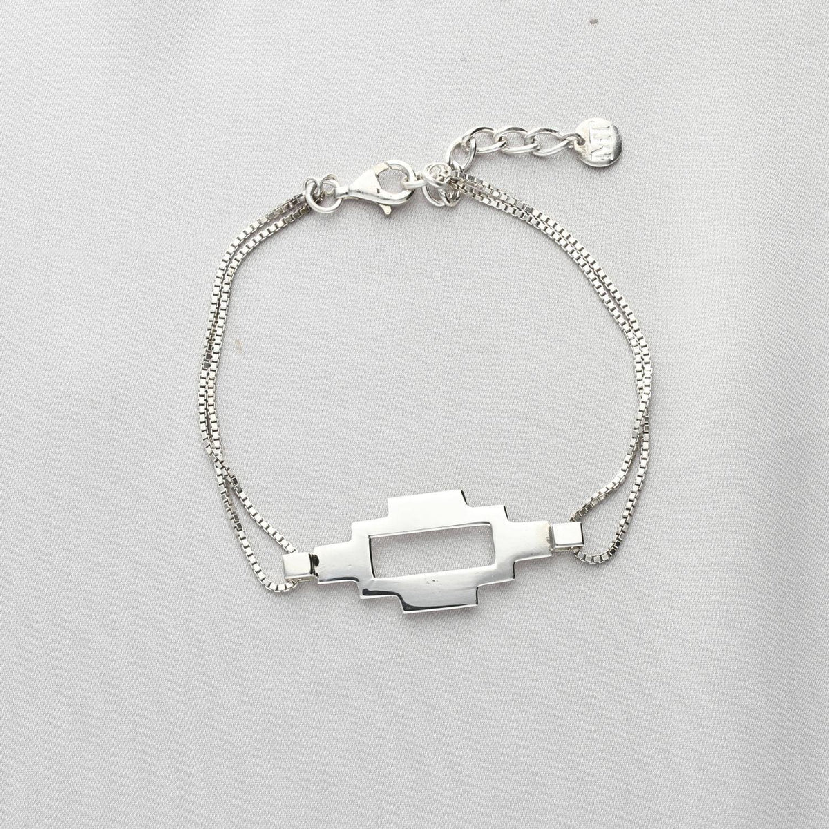 Caernarfon long bracelet, sterling silver — the Welsh weave stretched into a linear form — Breichled Arian