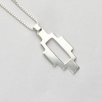 Side view of the Caernarfon long pendant, carrying the memory of home — Mwclis Arian