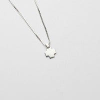 Carthenni cross pendant, sterling silver — a simpler, graphic take on the Welsh blanket weave — Mwclis Arian