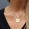 Carthenni  Embossed: Portcullis Design - Medium silver and gold pendant