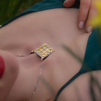 Carthenni Embossed: Portcullis Design - Large silver and gold pendant