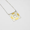 carthenni silver and gold plated pendant - welsh blankets mari thomas