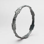 Carved: Black Silver Fractured Bangle - Mari Thomas Jewellery