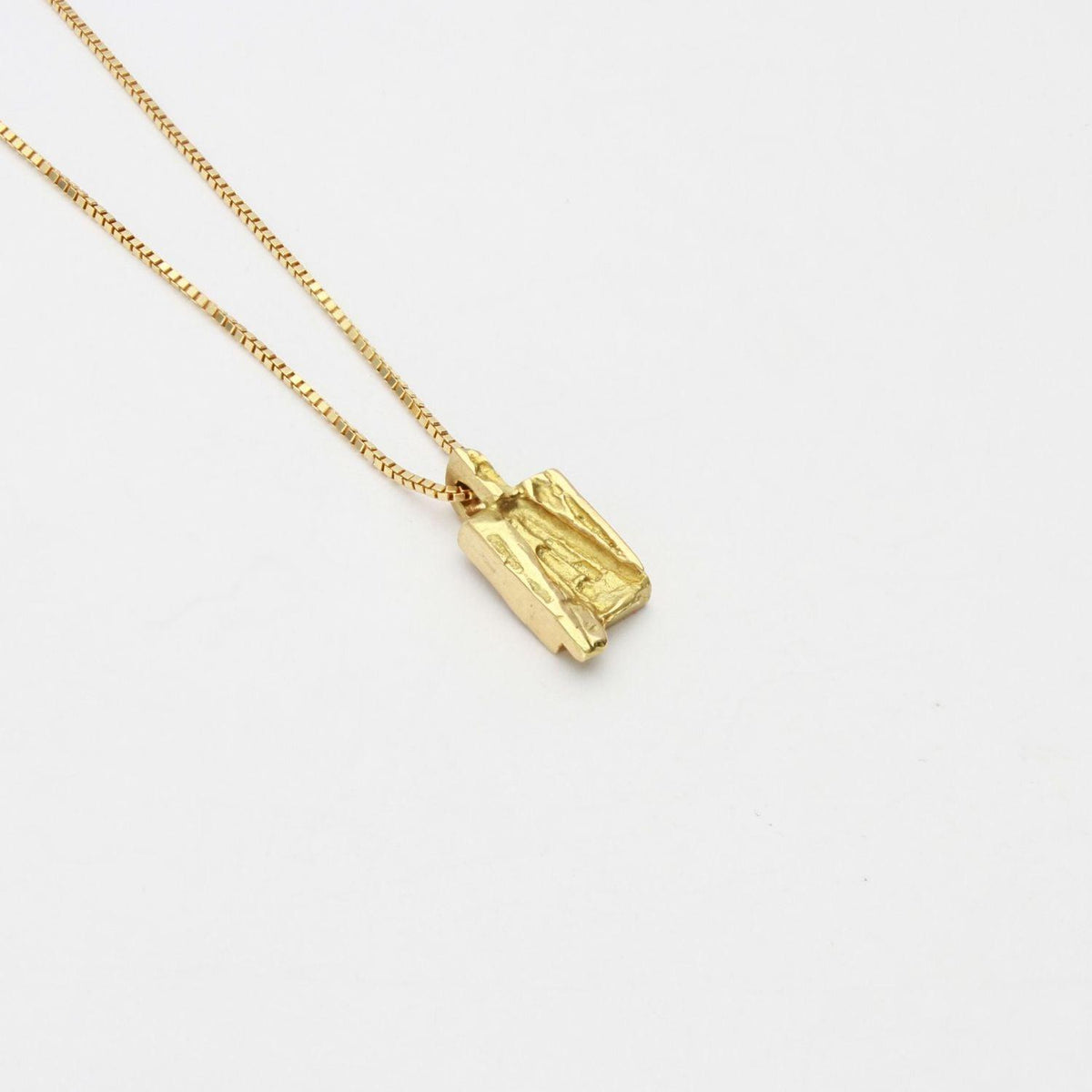 Contemporary Welsh gold jewellery designed and made in Wales and inspired by the Welsh landscape. The necklace is handcrafted in 18ct yellow gold 