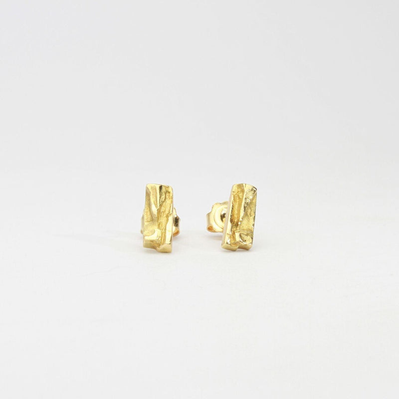 Contemporary Welsh gold jewellery designed and made in Wales and inspired by the Welsh landscape. The  stud earrings are  handcrafted in solid 18ct yellow gold 