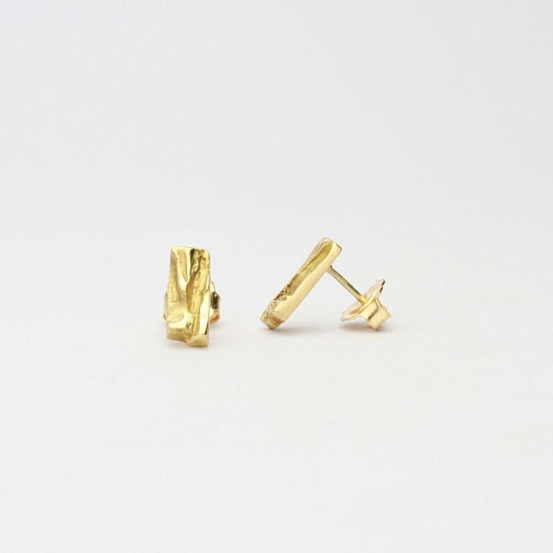 Contemporary Welsh gold jewellery designed and made in Wales and inspired by the Welsh landscape. The  stud earrings show here in detail are  handcrafted in solid 18ct yellow gold 