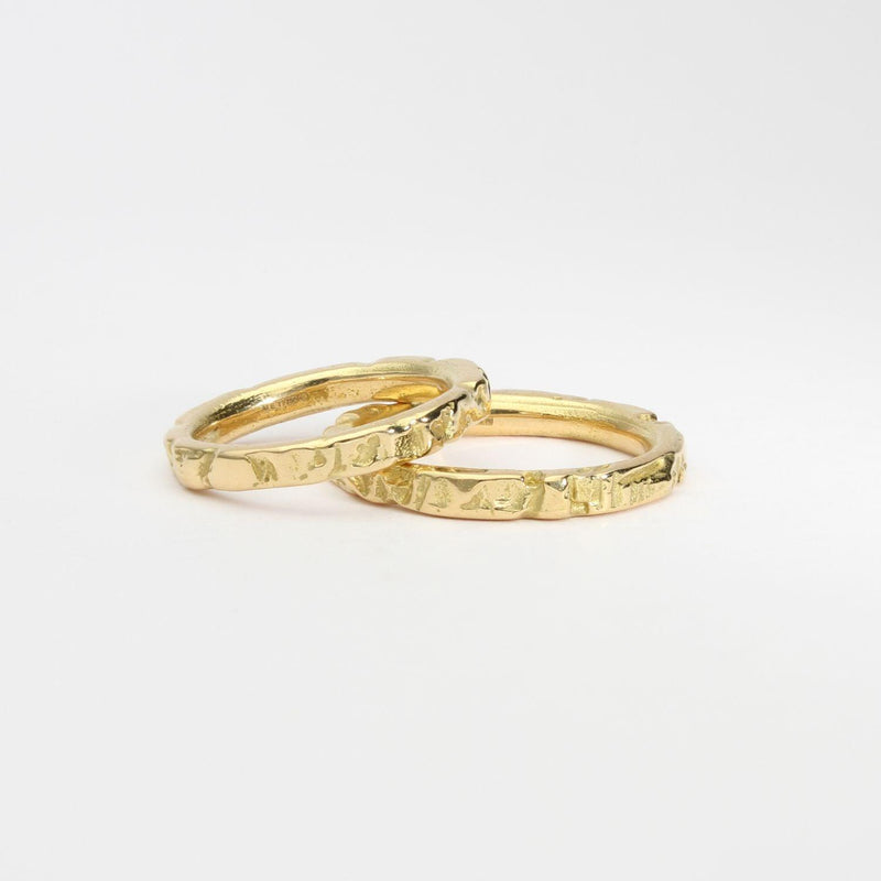 Contemporary Welsh gold jewellery designed and made in Wales and inspired by the Welsh landscape. These rings suitable for men or women would be perfect as wedding rings or suitable to stack and are  handcrafted in solid 18ct yellow gold 