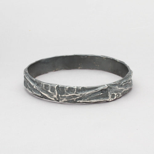 Carved: Wide Black Silver Bangle - Mari Thomas Jewellery