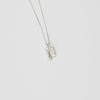 Small carved silver pendant