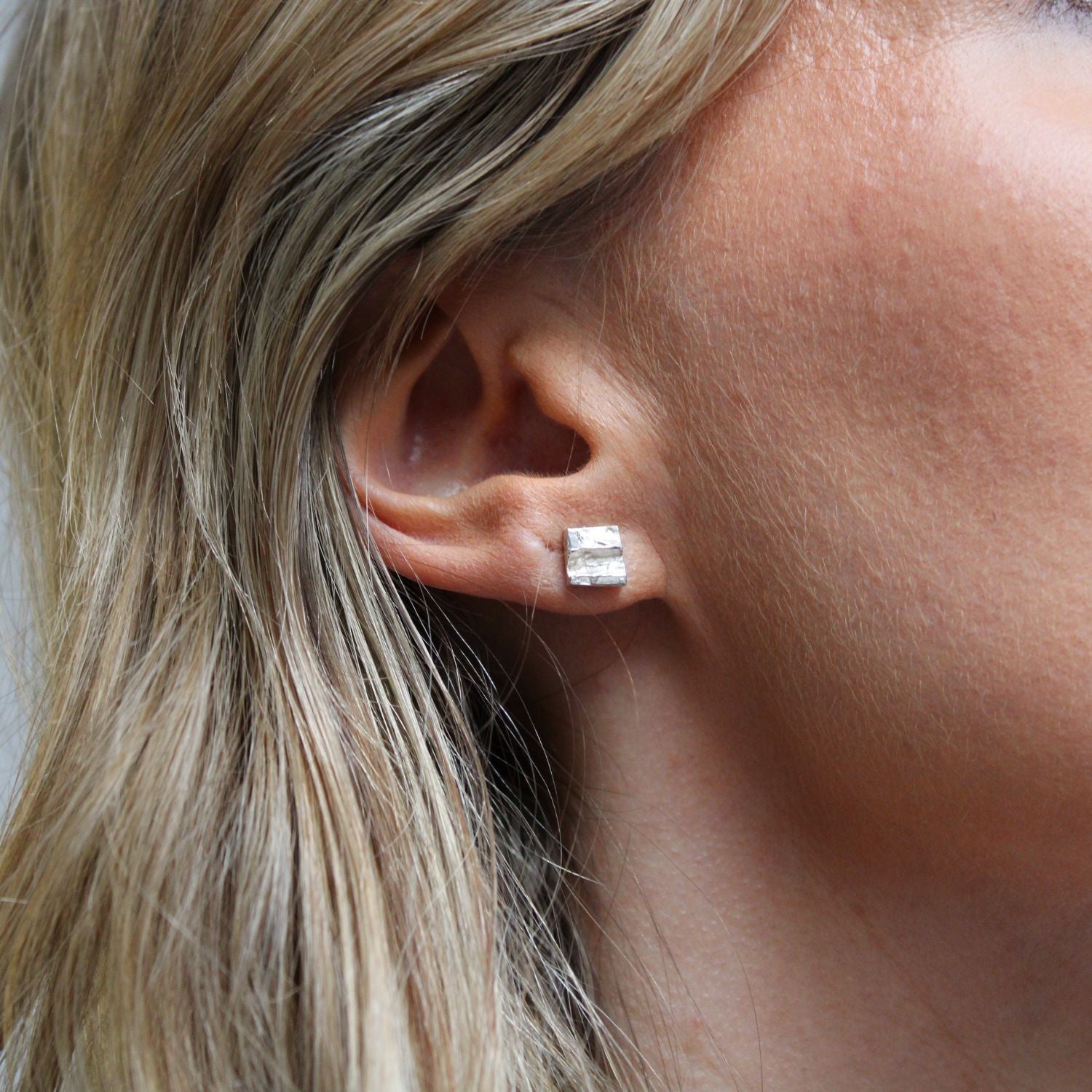 Contemporary stud earrings on sale