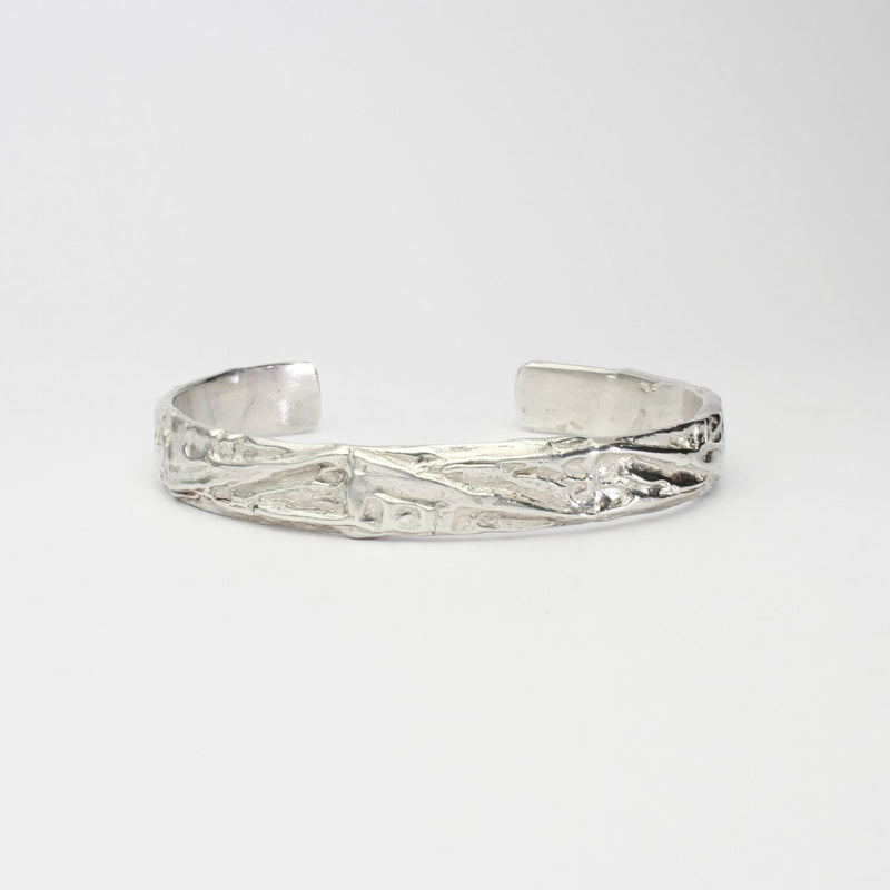 Contemporary Welsh silver jewellery. Inspired by the beautiful landscape of Wales. This torque cuff bangle is designed and handmade in Wales. Suitable for men or women.