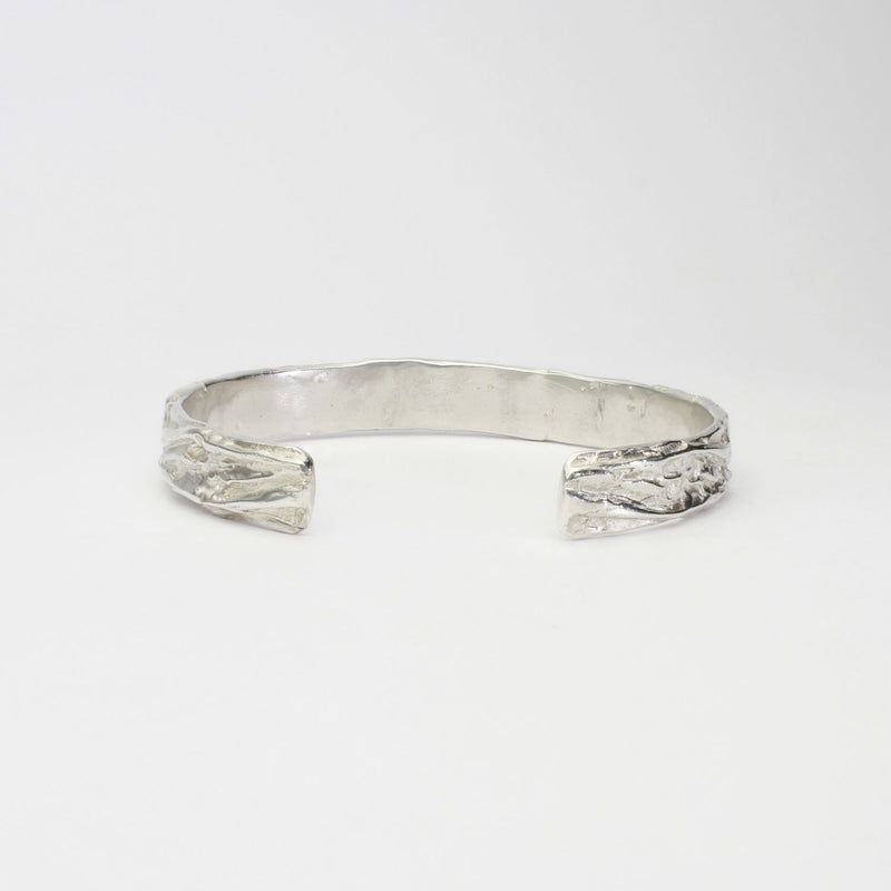 Contemporary Welsh silver jewellery. Inspired by the beautiful landscape of Wales. This torque cuff bangle is designed and handmade in Wales. Suitable for men or women.