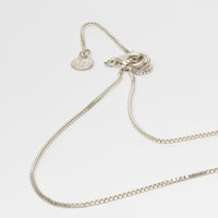 One of a Kind: ( No.18 ) Bespoke Carreg necklace / brooch in silver with baguette cut diamond