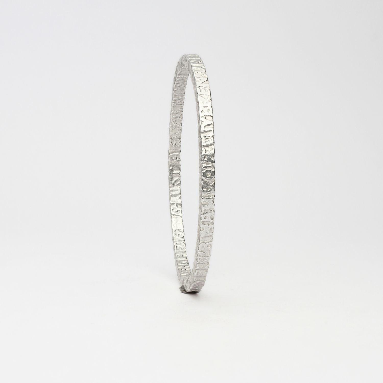 Cofio sterling silver bangle, angle view