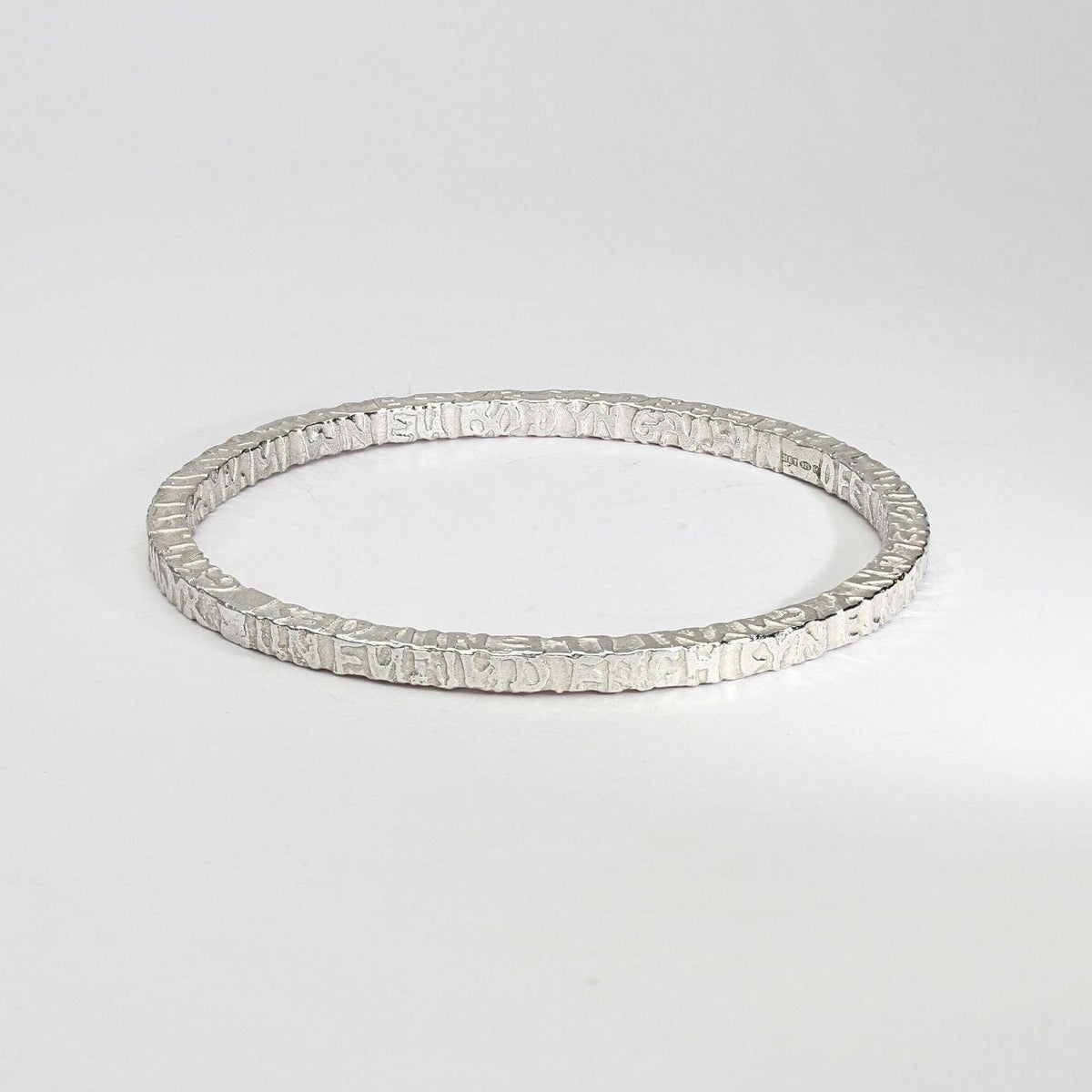 Cofio sterling silver bangle, front view