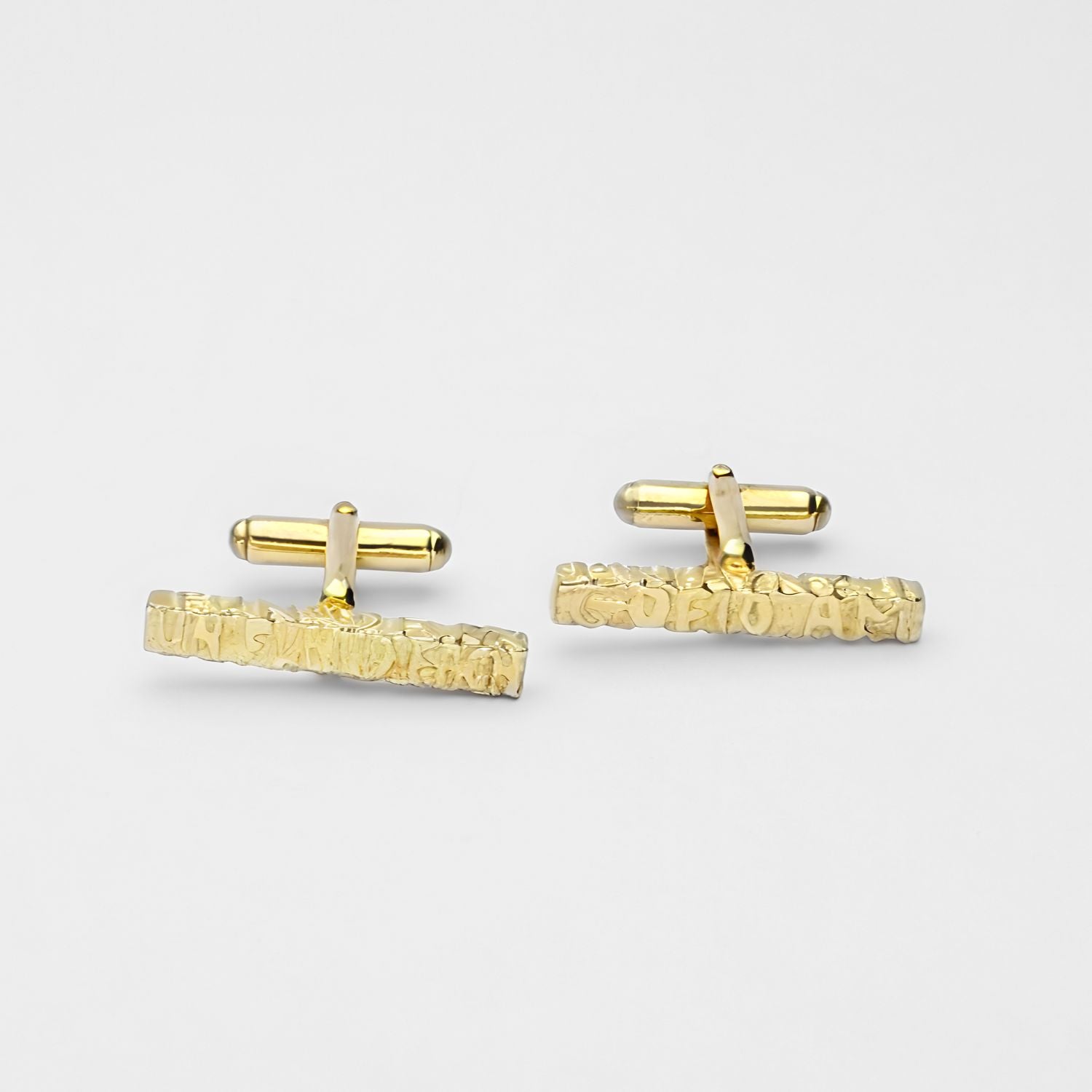 Cofio cufflinks, silver and 18ct gold plated silver — Waldo Williams's words cast in metal — Botymau Coesau Arian ac Aur
