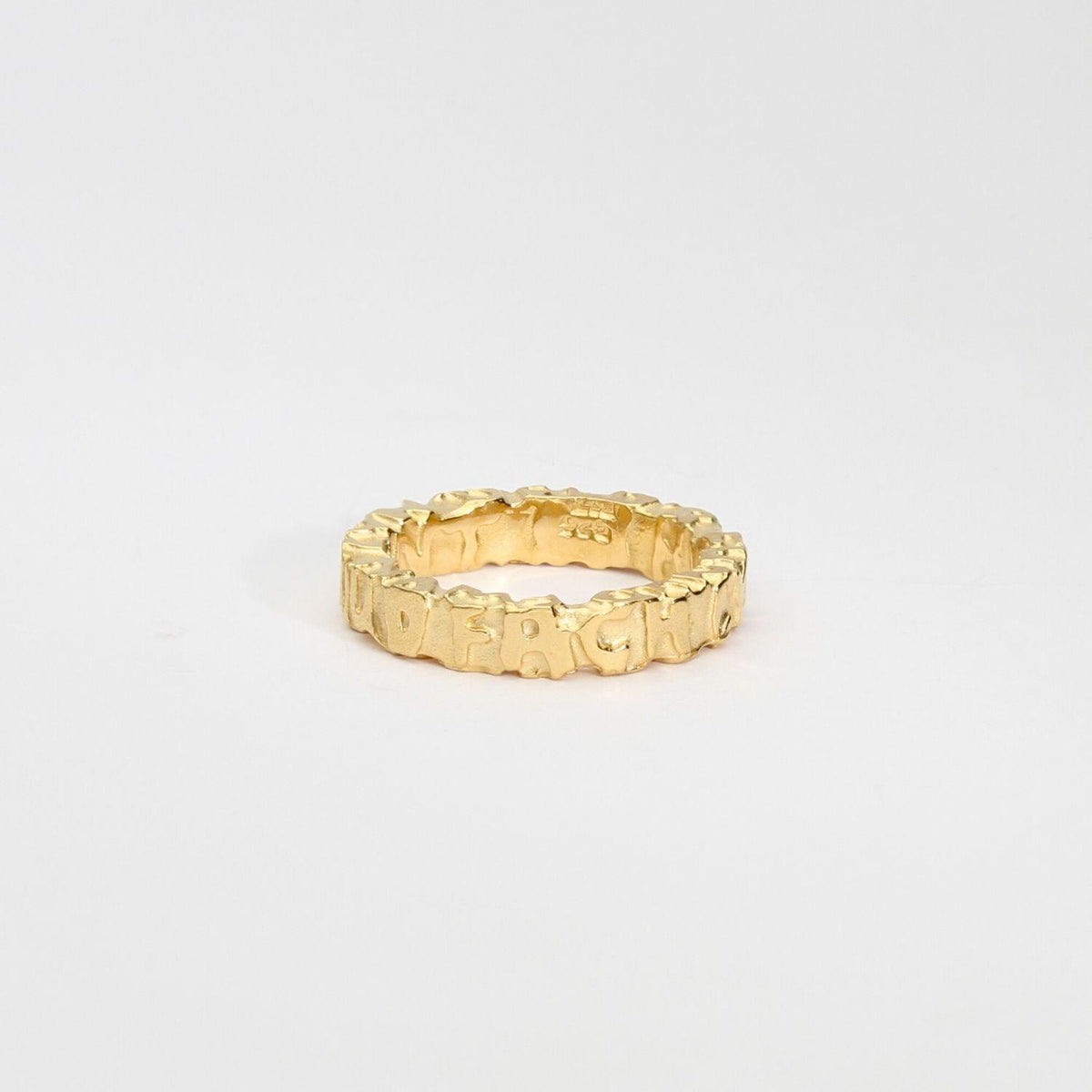Cofio ring, silver and 18ct gold plated silver — Waldo Williams's words cast in metal — Modrwy Arian ac Aur
