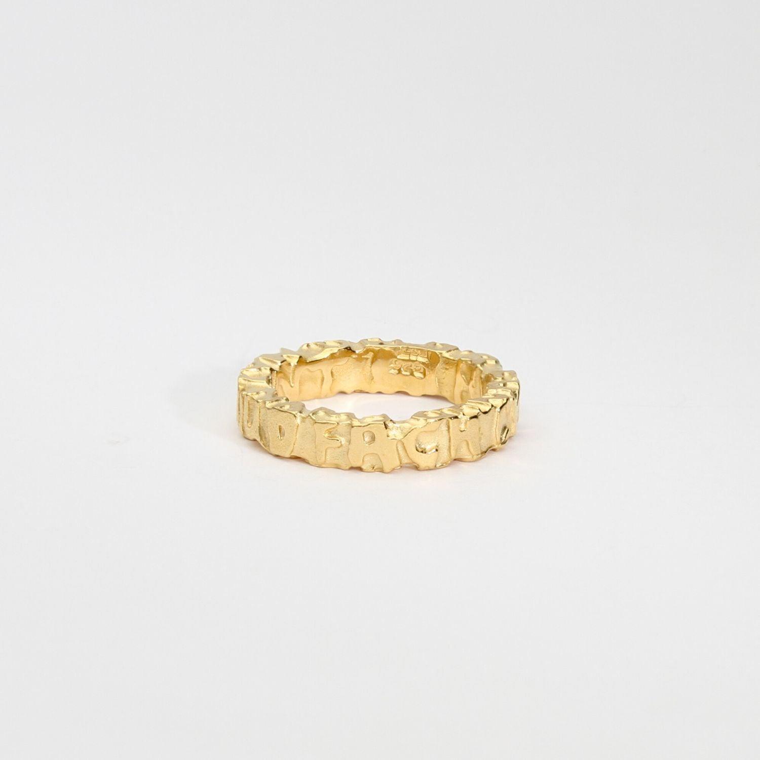 Cofio ring, silver and 18ct gold plated silver — Waldo Williams's words cast in metal — Modrwy Arian ac Aur