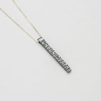 Cofio pendant, black oxidised silver — Waldo Williams's words cast in metal — Mwclis Arian