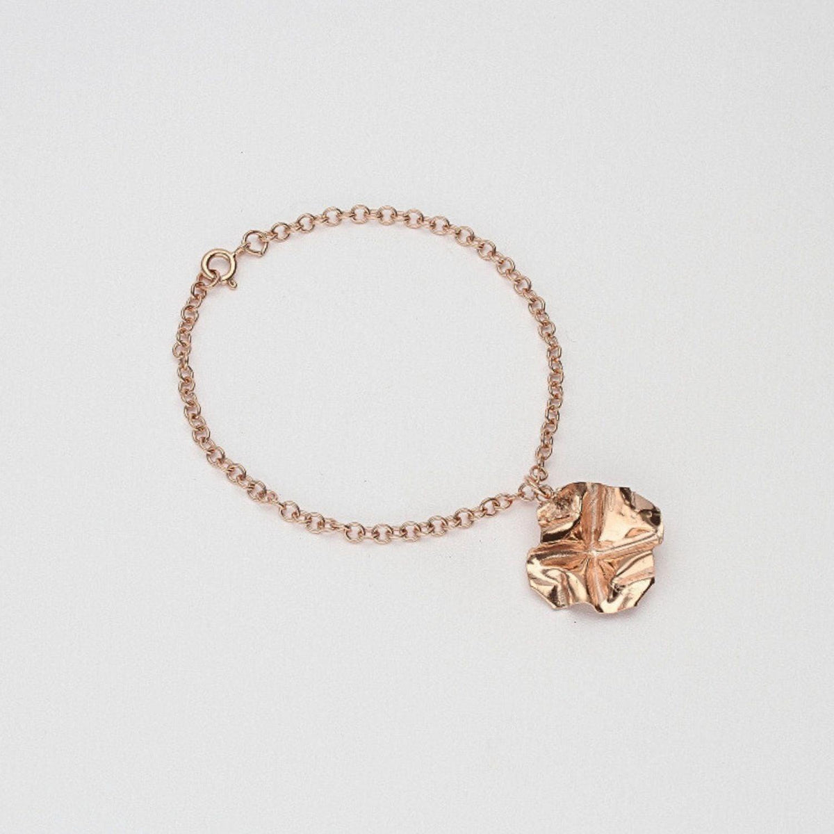 Decorative Concepts charm bracelet in 18ct rose gold plated silver, front view