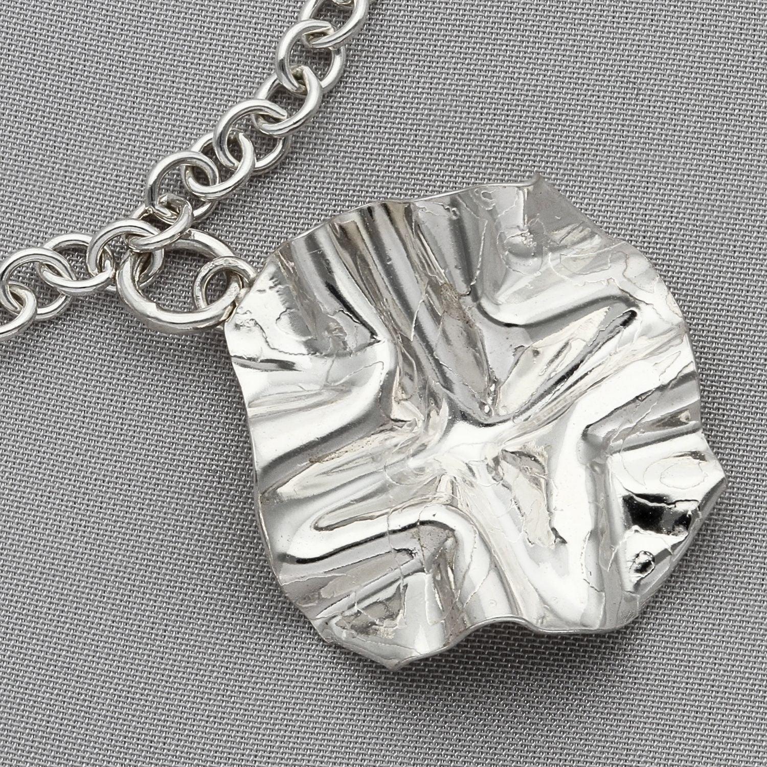 Decorative Concepts sterling silver charm bracelet, styled