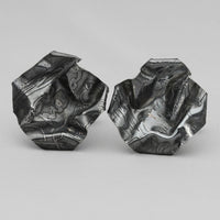 Side view of the Decorative Concepts black cufflinks, echoing a pencil-drawn line — Botymau Coesau Arian