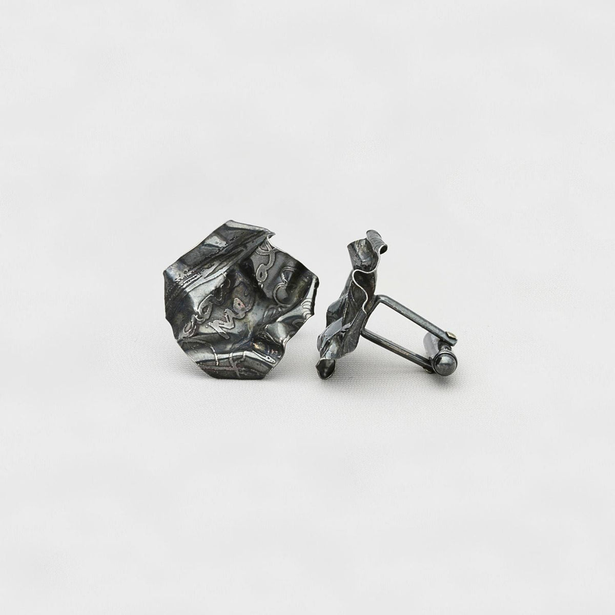 Decorative Concepts cufflinks in black oxidised silver, front view