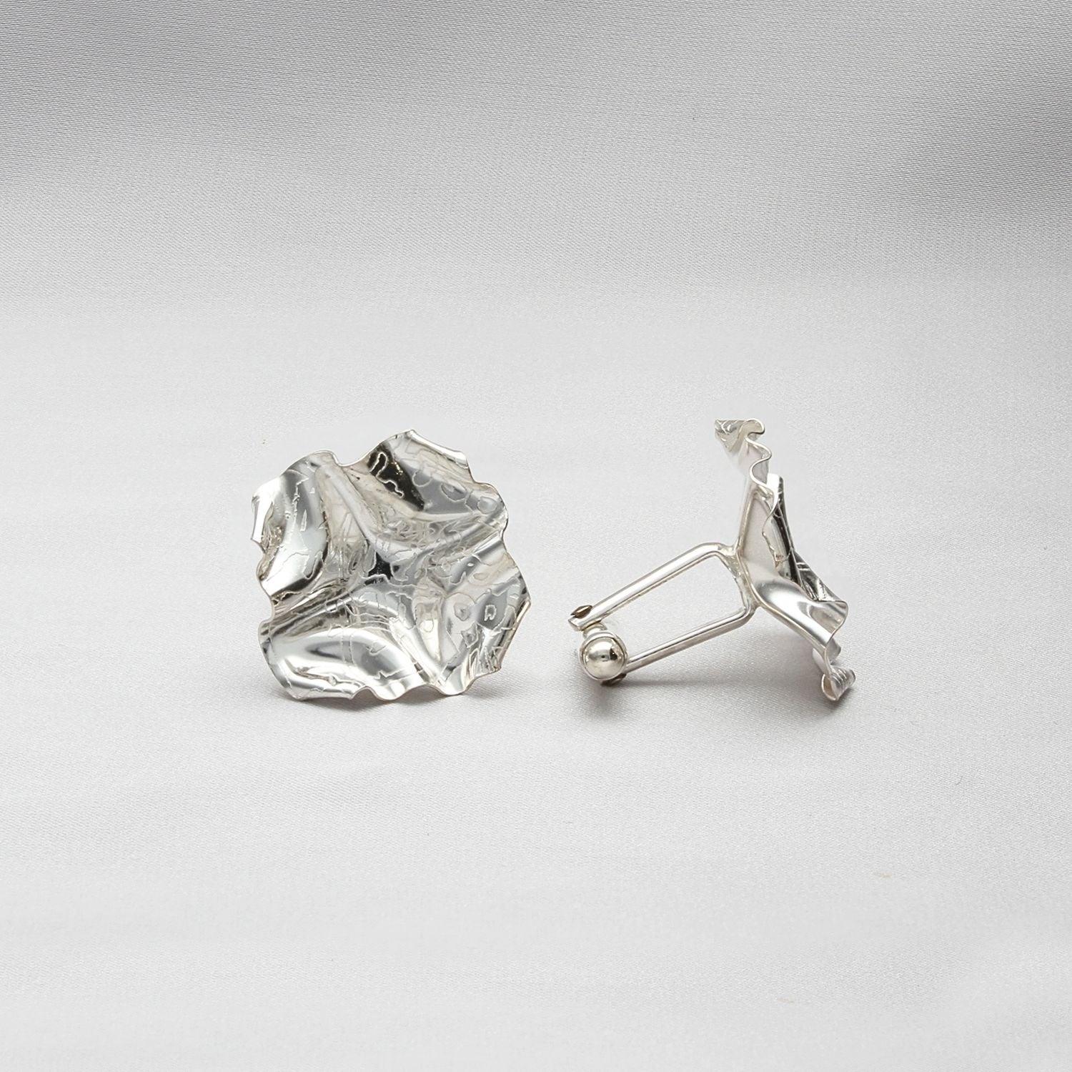 Decorative Concepts cufflinks, a considered mark cast in sterling silver — Botymau Coesau Arian